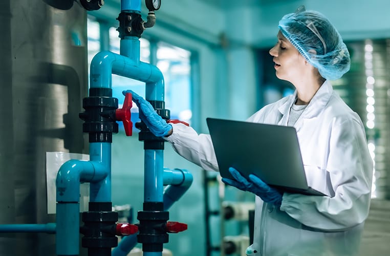 ro-system woman checking a reverseosmosis system